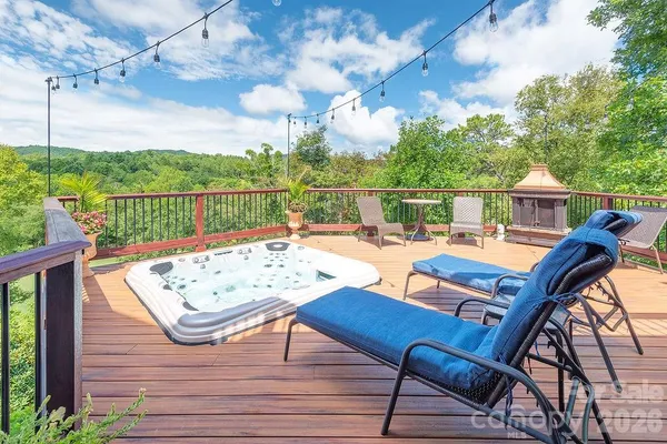 a view of a patio with wooden floor
