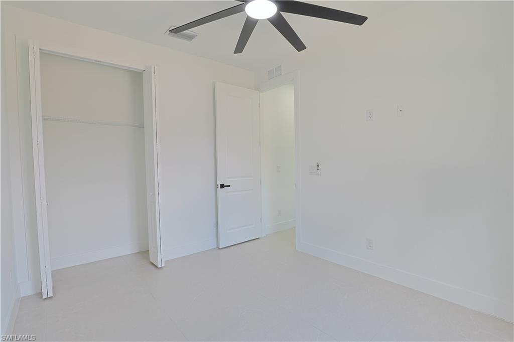 613-615 West 12th Street Lehigh Acres, FL 33972 - Photo 24 of 32 a view of an empty room