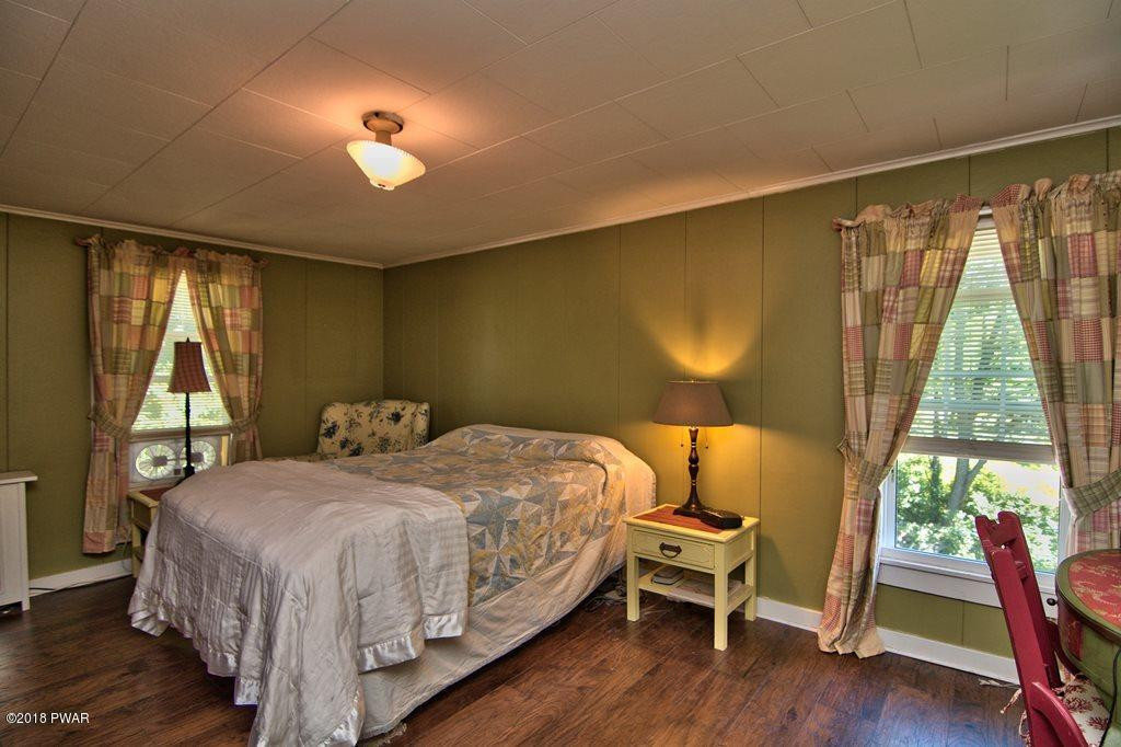 72 Hemlock Road Lake Ariel, PA 18436 - Photo 38 of 48 a bedroom with a bed and a window