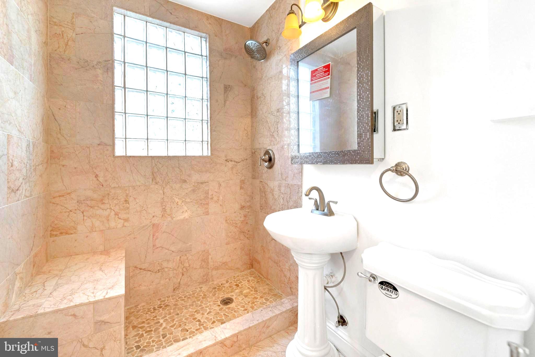 19 Hamilton Street Northeast, Unit 1 Washington, DC 20011 - Photo 13 of 17 Elegant marble shower retreat.