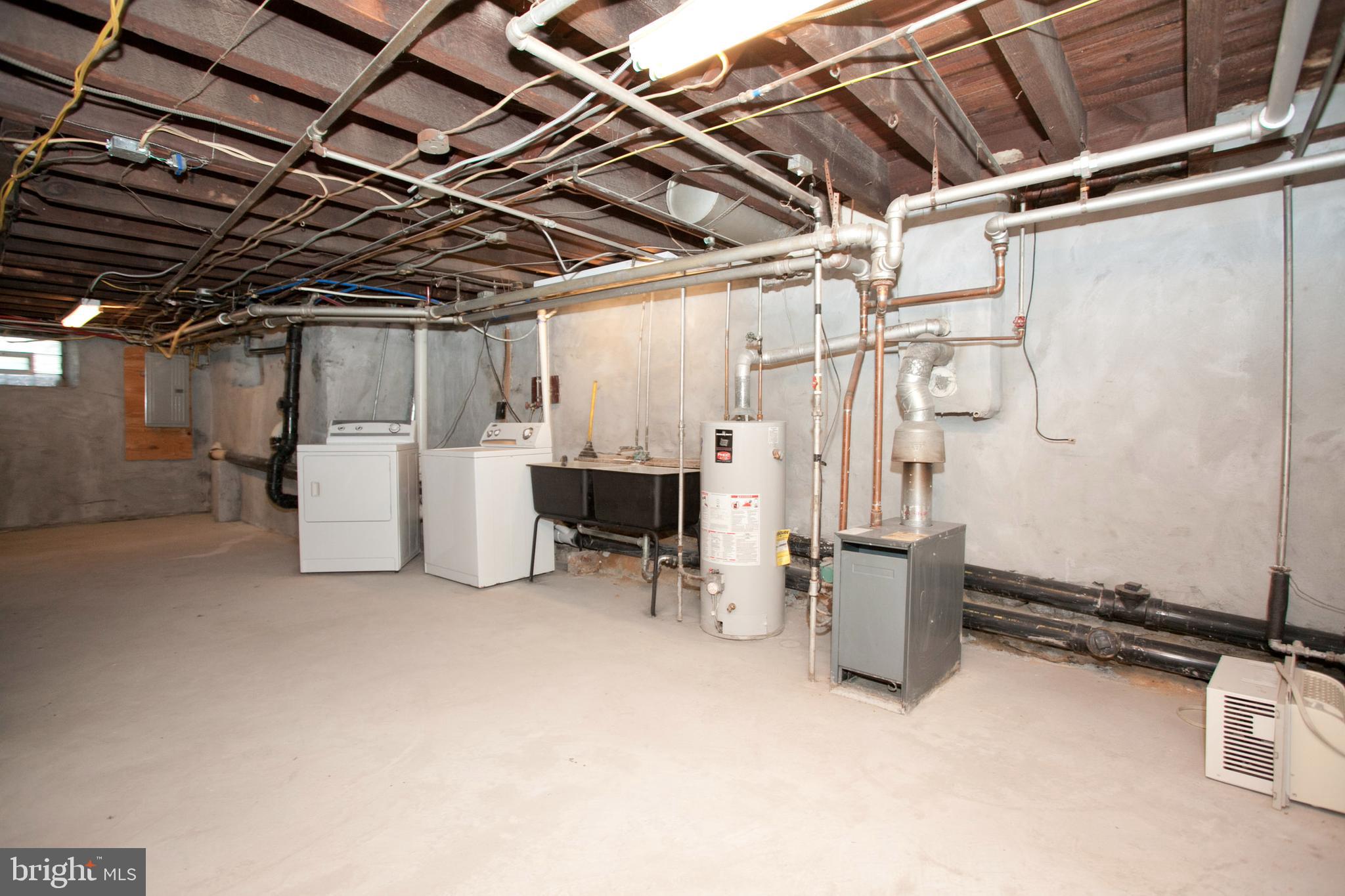 4205 Terrace Street Philadelphia, PA 19128 - Photo 26 of 30 a view of a storage room with utility room