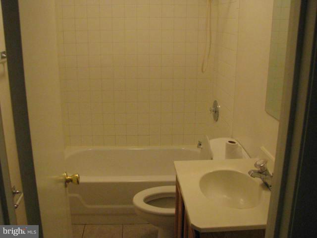 17981 Possum Point Road Dumfries, VA 22026 - Photo 25 of 27 a bathroom with a sink and a mirror