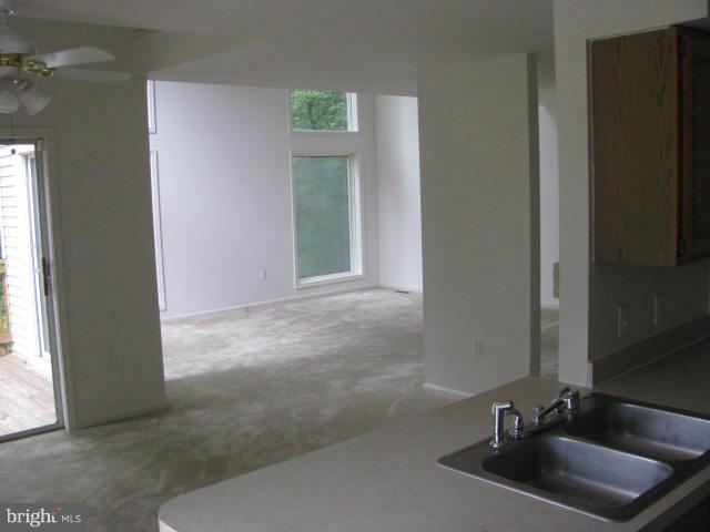 17981 Possum Point Road Dumfries, VA 22026 - Photo 10 of 27 a bathroom with a sink and a mirror