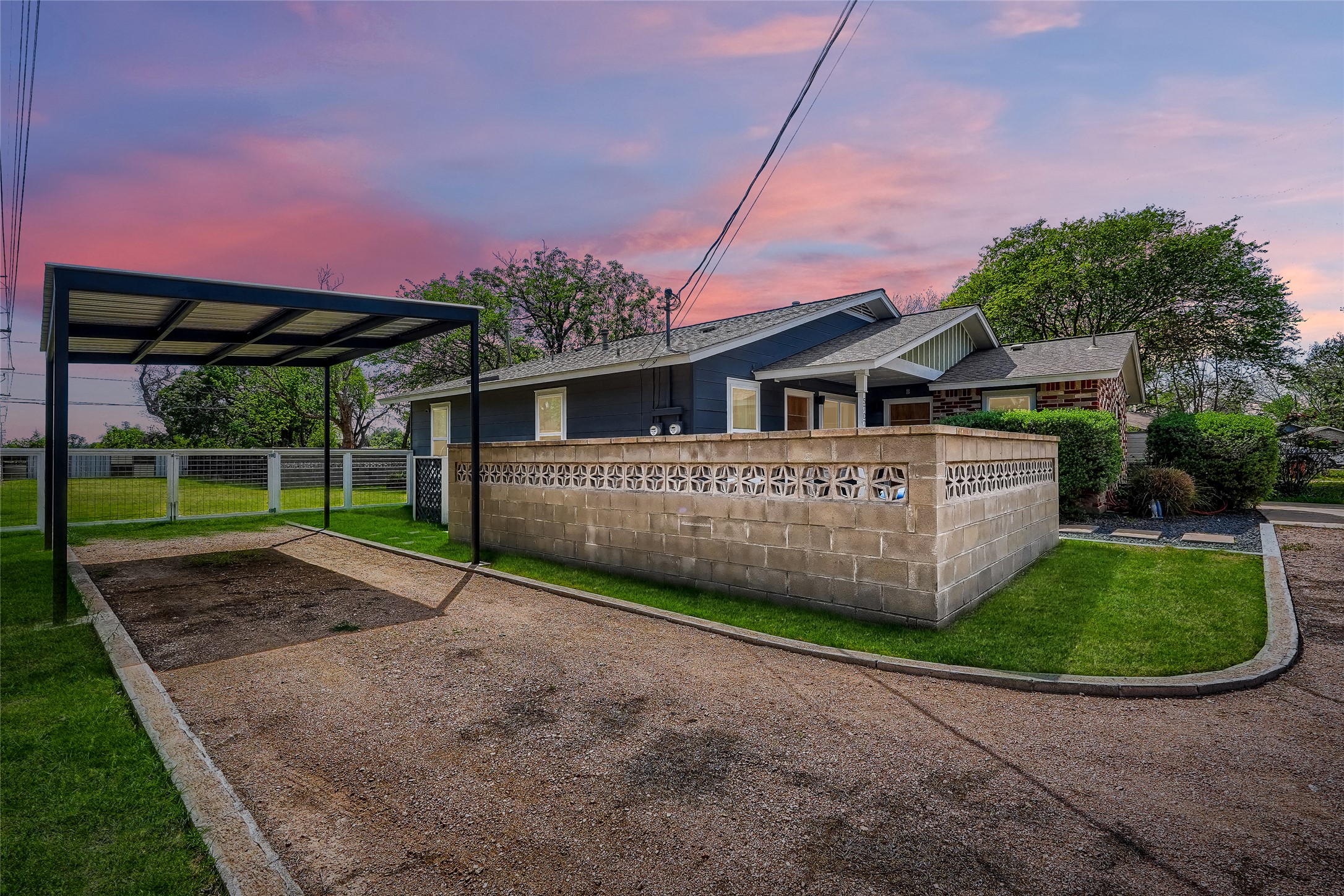 5707 Tracy Lynn Lane, Unit A Austin, TX 78721 - Photo 6 of 33 View of front a detached carport and a porch