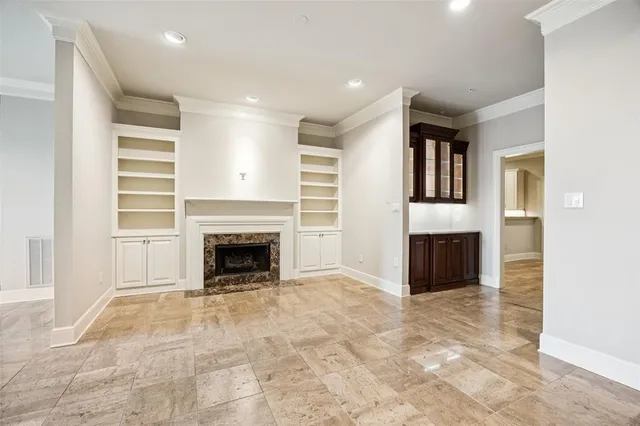 a view of kitchen and fireplace