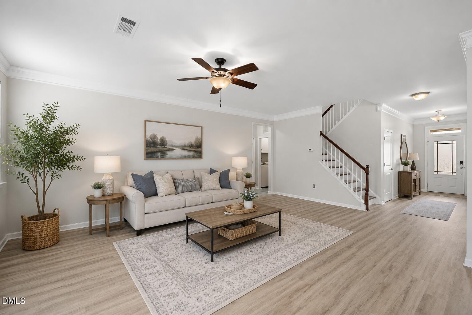 364 Springtime Fields Lane Wake Forest, NC 27587 - Photo 16 of 63 a living room with furniture and a wooden floor