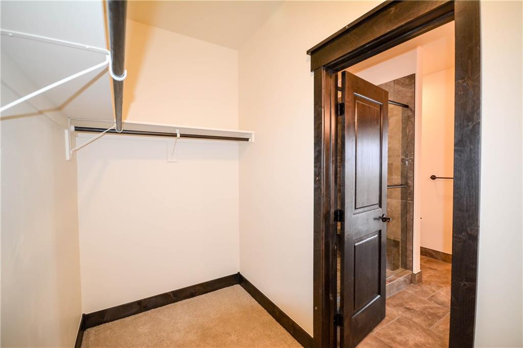 764 Independence Road, Unit 1B Keystone, CO 80435 - Photo 23 of 25 a view of a hallway with a door and a hallway