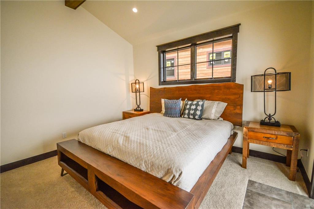 764 Independence Road, Unit 1B Keystone, CO 80435 - Photo 5 of 25 a bedroom with a bed and window