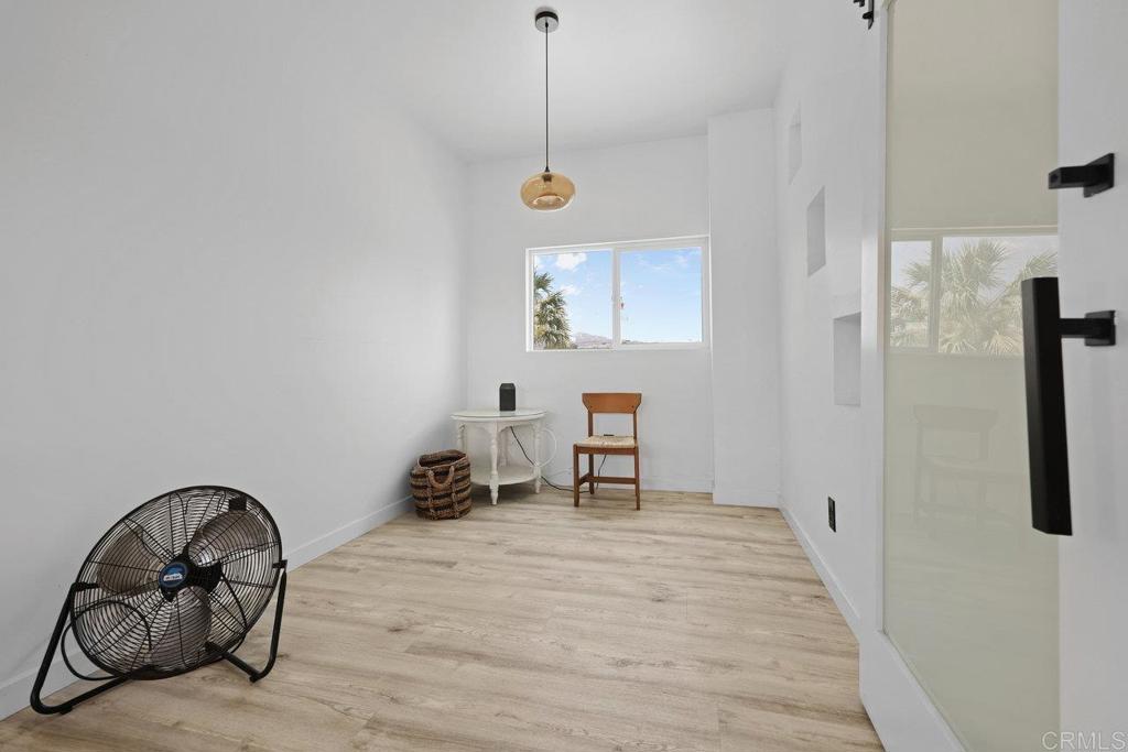 12953 Carriage Road Poway, CA 92064 - Photo 21 of 42 a view of a livingroom with furniture and front door