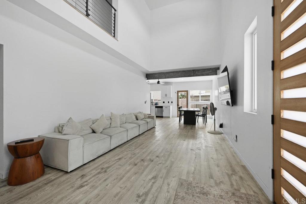 12953 Carriage Road Poway, CA 92064 - Photo 3 of 42 a living room with furniture and a wooden floor