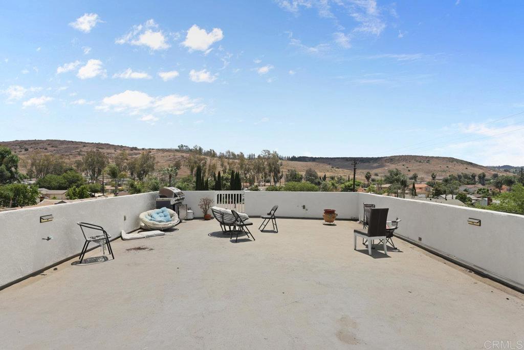 12953 Carriage Road Poway, CA 92064 - Photo 33 of 42 a view of a terrace with couches and sky view