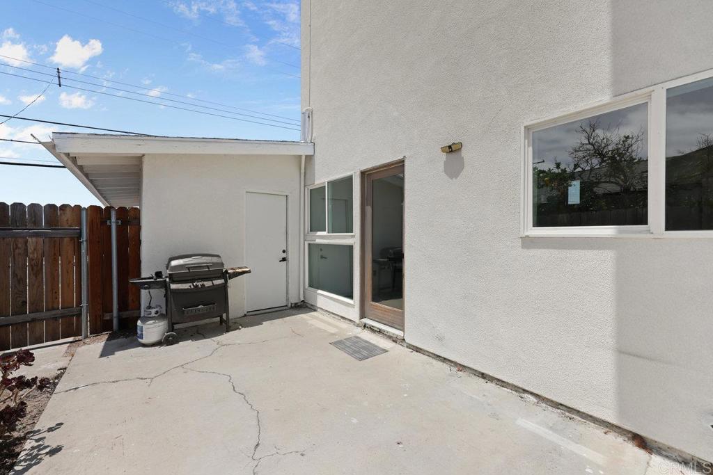 12953 Carriage Road Poway, CA 92064 - Photo 34 of 42 a bedroom with a bed and a painting on the wall