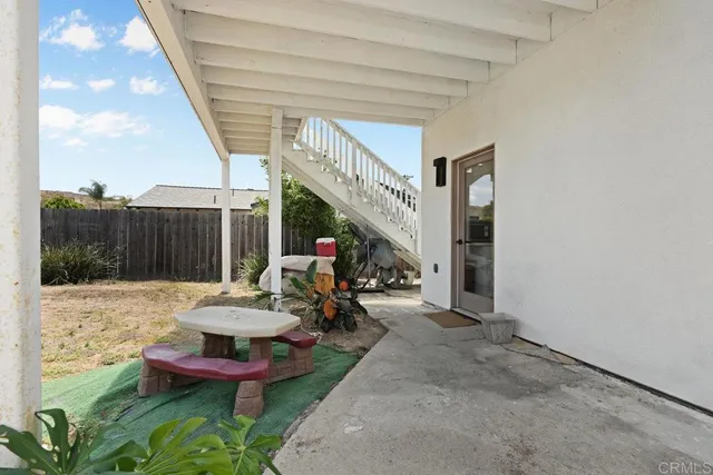 a view of a chairs in patio