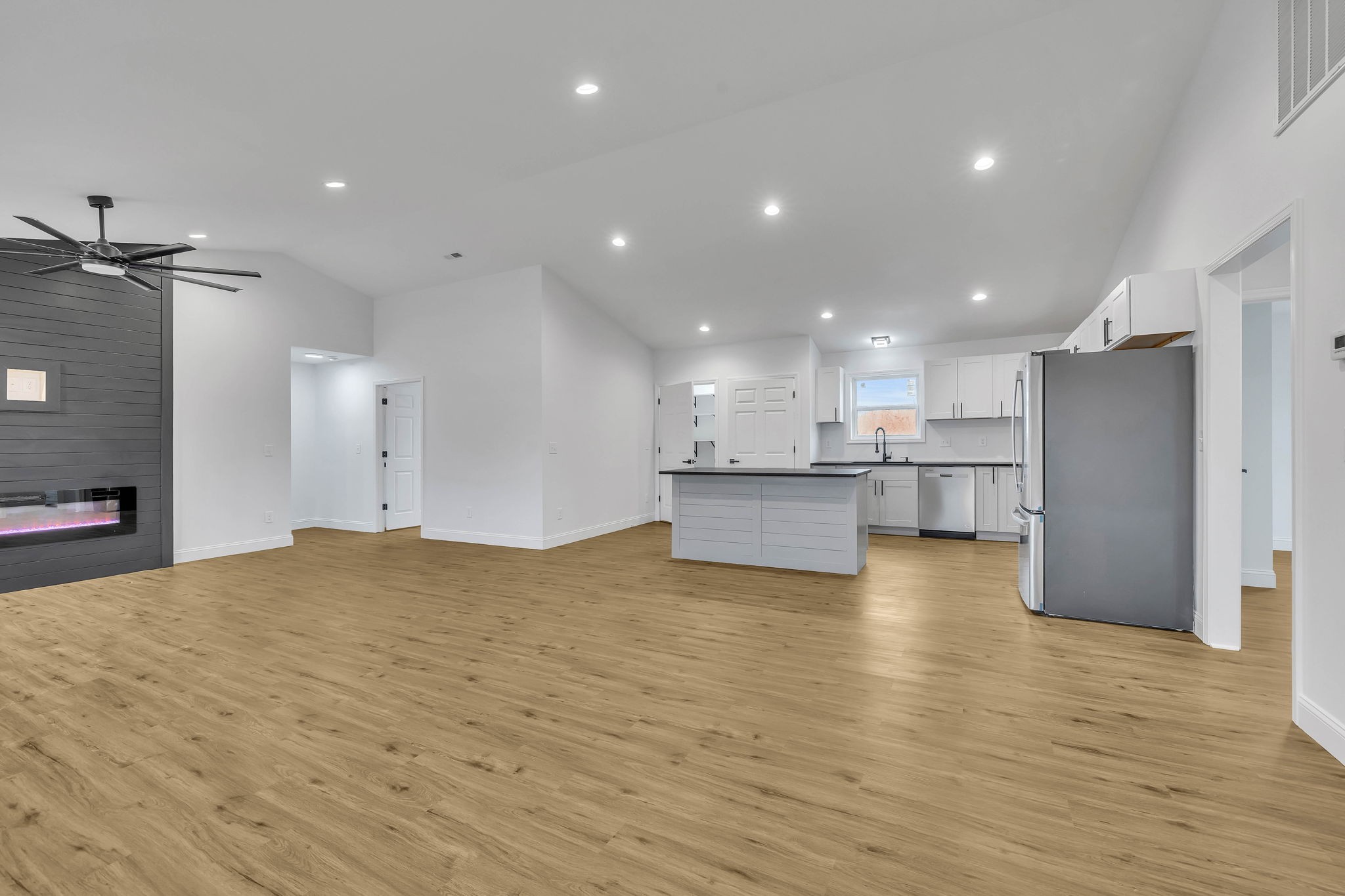 129 Colonial Road Hohenwald, TN 38462 - Photo 15 of 33 a view of kitchen with kitchen island a sink stainless steel appliances refrigerator and cabinets