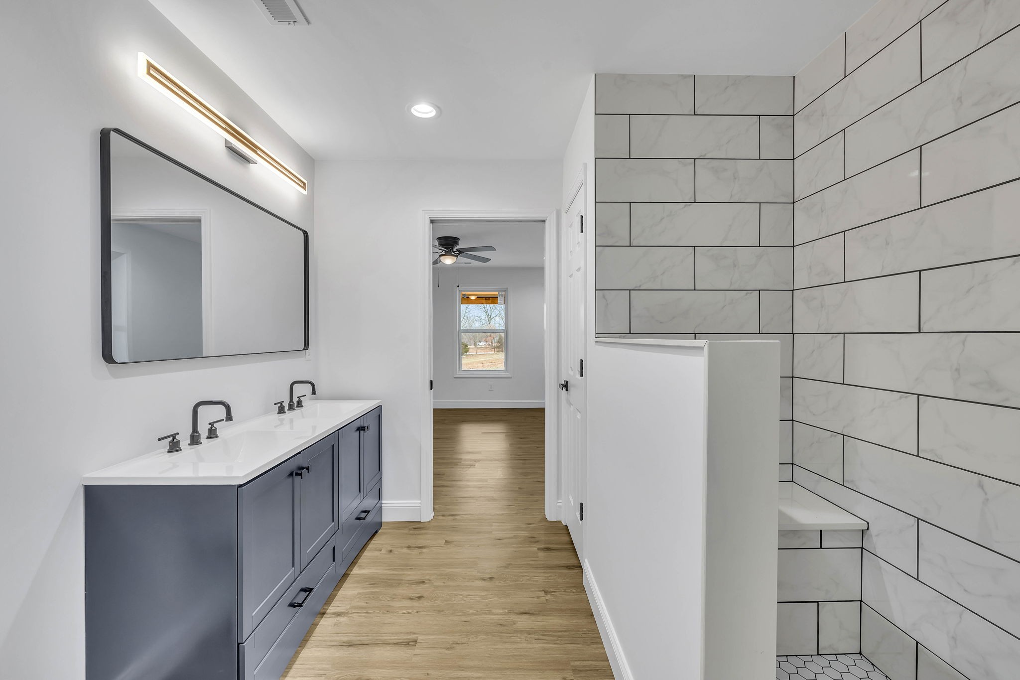 129 Colonial Road Hohenwald, TN 38462 - Photo 27 of 33 a bathroom with a sink and a mirror