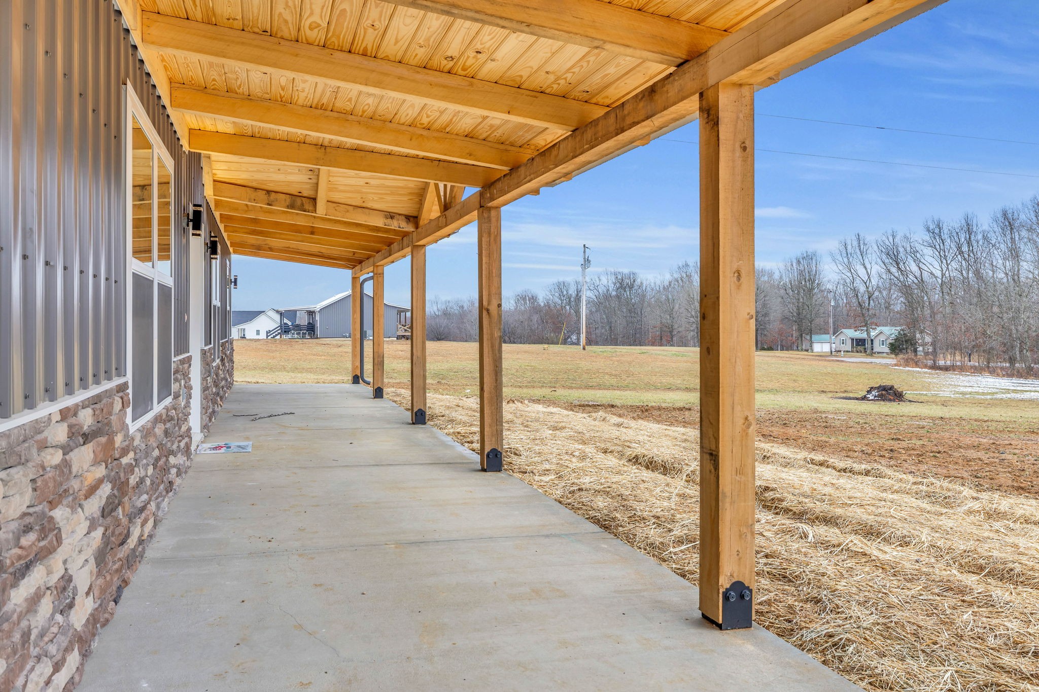 129 Colonial Road Hohenwald, TN 38462 - Photo 3 of 33 a view of a porch
