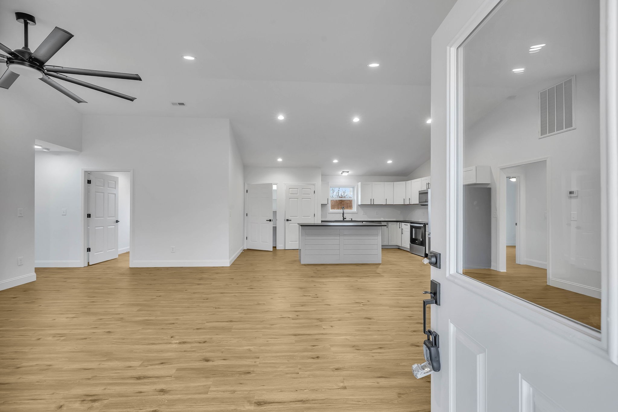 129 Colonial Road Hohenwald, TN 38462 - Photo 7 of 33 a view of kitchen with kitchen island a sink stainless steel appliances and cabinets