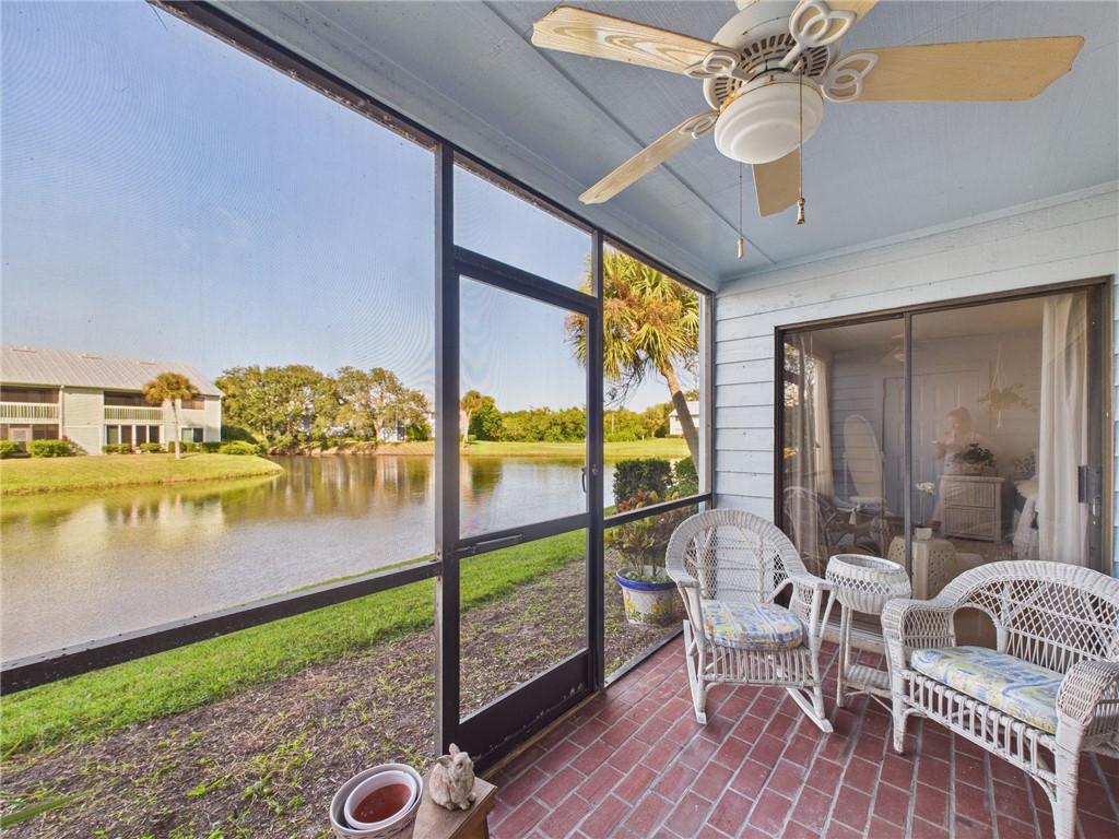 5730 Pelican Pointe Drive, Unit 2 Sebastian, FL 32958 - Photo 4 of 19 a view of a balcony with hardwood