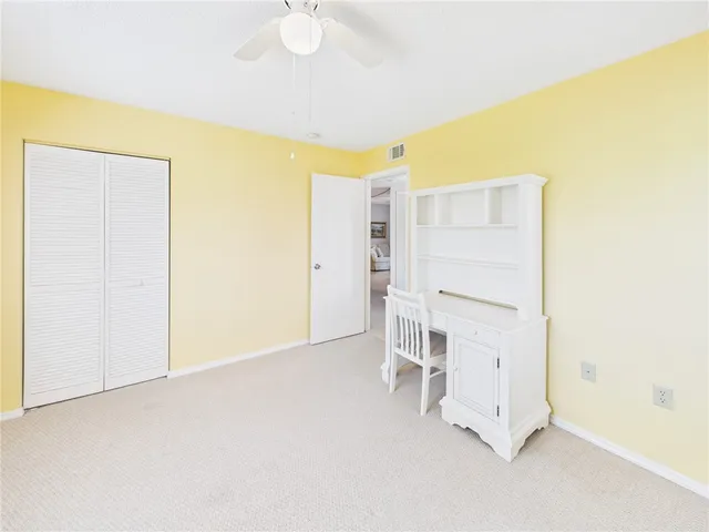 a view of an empty room with a sink