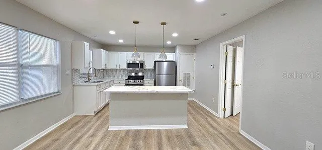 an empty room with windows