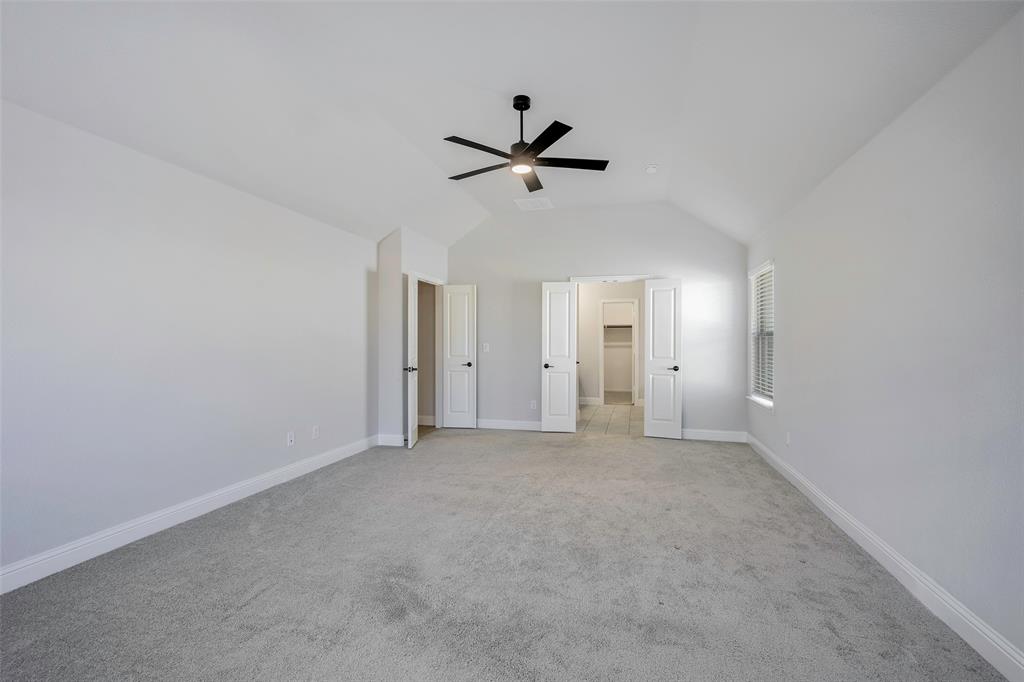 226 Comanche Trail Alvarado, TX 76009 - Photo 13 of 28 an empty room with closet and windows