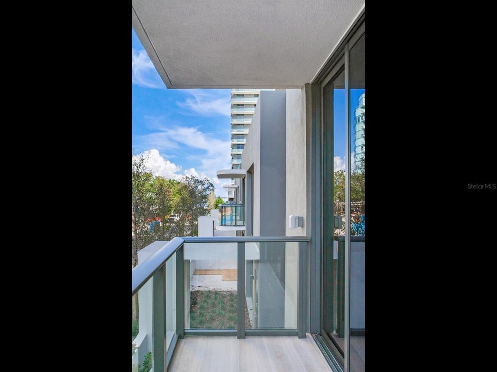 3020 West Santiago Street, Unit 4 Tampa, FL 33629 - Photo 73 of 99 a view of a balcony from a door