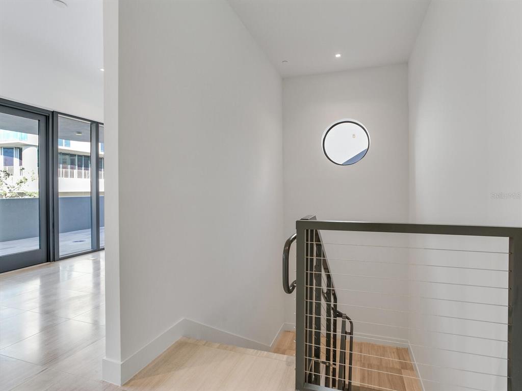 3020 West Santiago Street, Unit 4 Tampa, FL 33629 - Photo 82 of 99 a view of a room with wooden floor and windows
