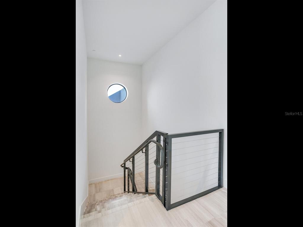 3020 West Santiago Street, Unit 4 Tampa, FL 33629 - Photo 83 of 99 a view of staircase with white walls and a window