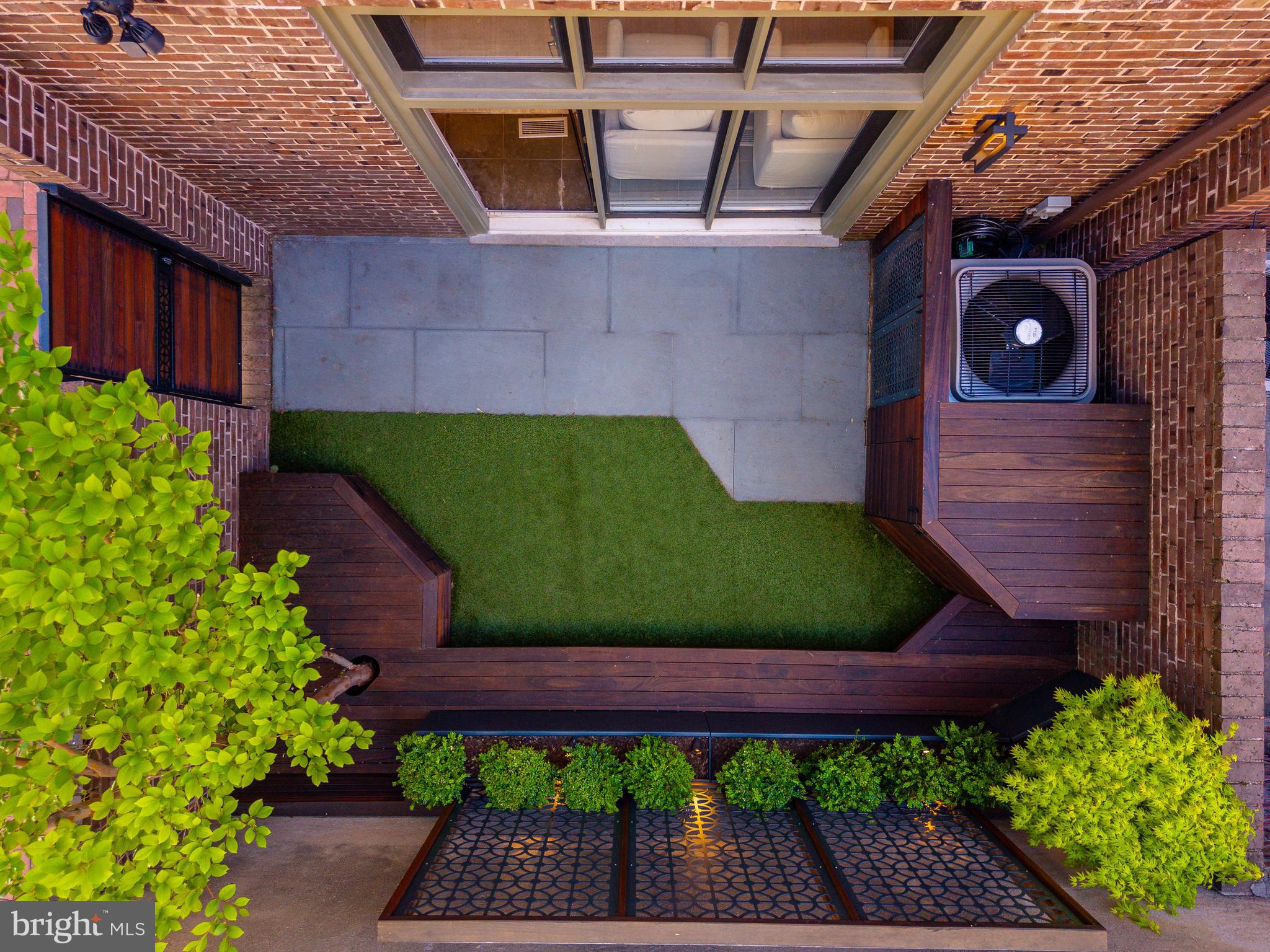 406 South 6th Street Philadelphia, PA 19147 - Photo 15 of 56 a view of a backyard with sitting area