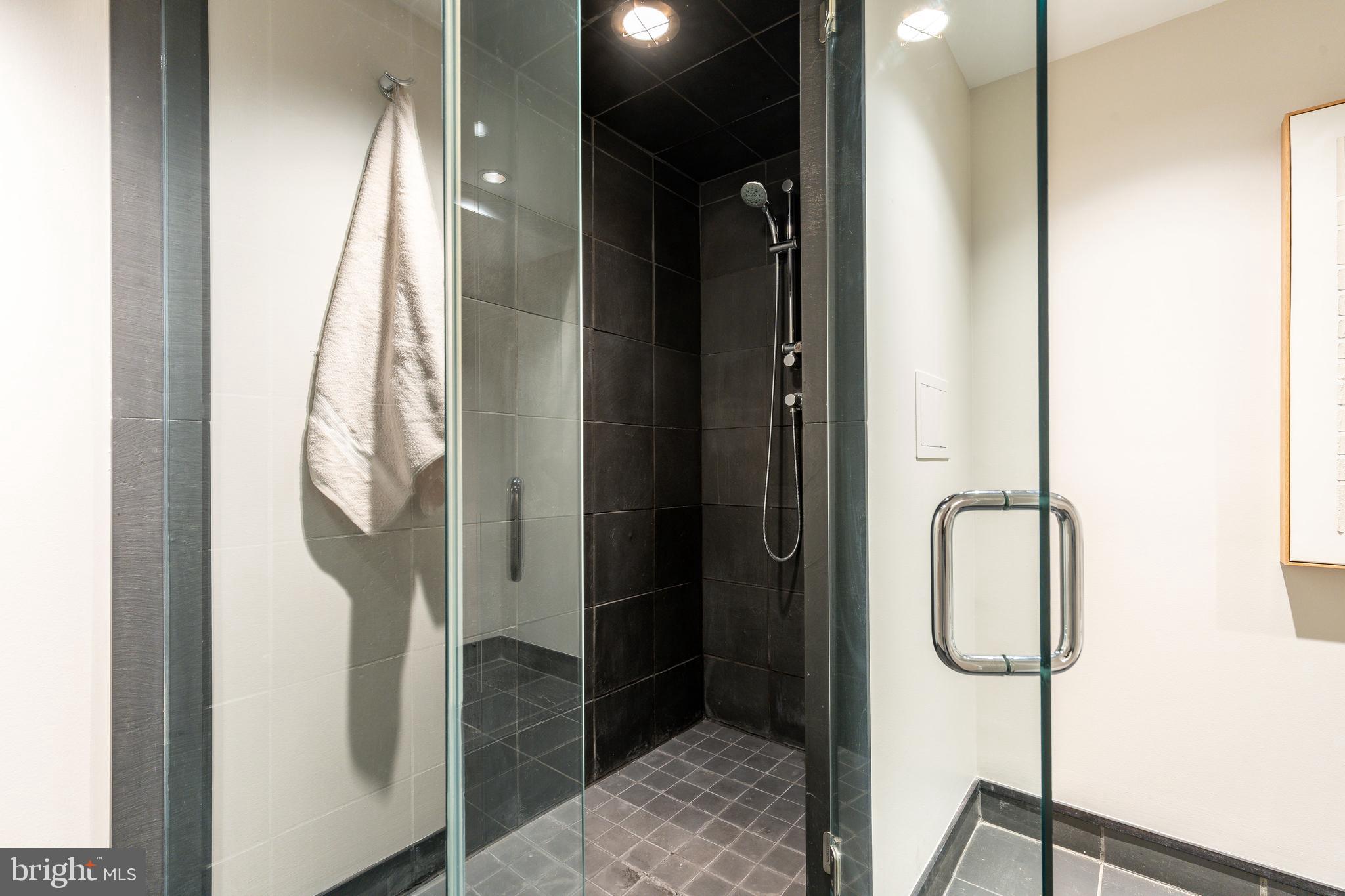 406 South 6th Street Philadelphia, PA 19147 - Photo 26 of 56 a bathroom with a shower and a sink