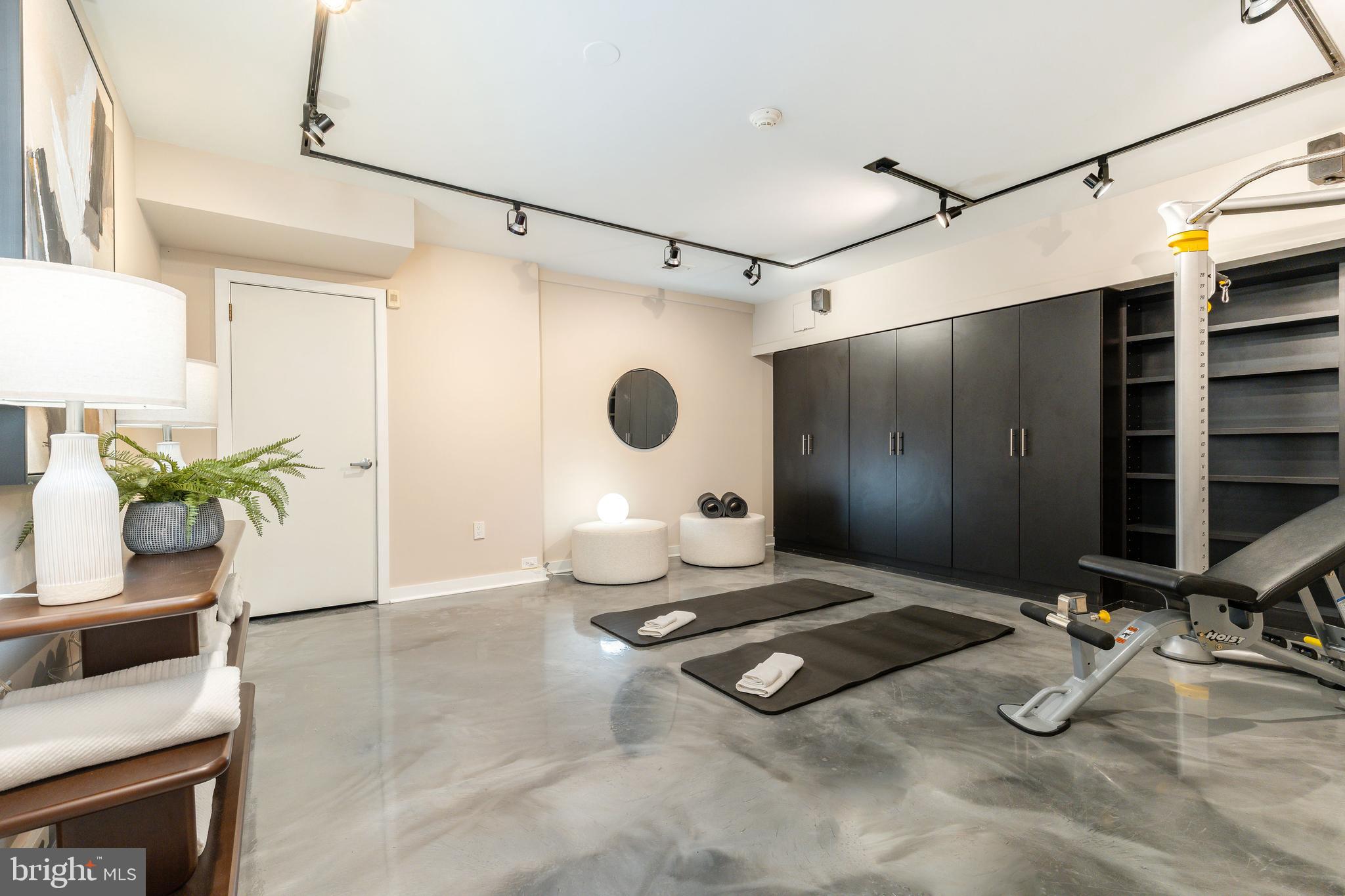 406 South 6th Street Philadelphia, PA 19147 - Photo 46 of 56 a room with gym equipment and a shower