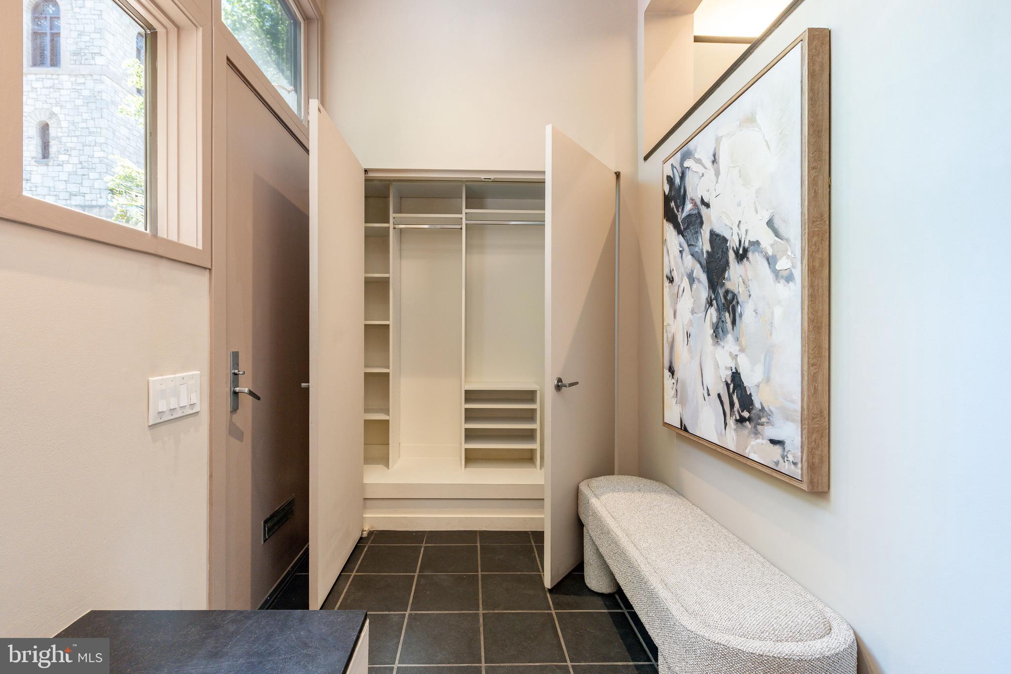 406 South 6th Street Philadelphia, PA 19147 - Photo 7 of 56 a bathroom with a toilet and a shower curtain
