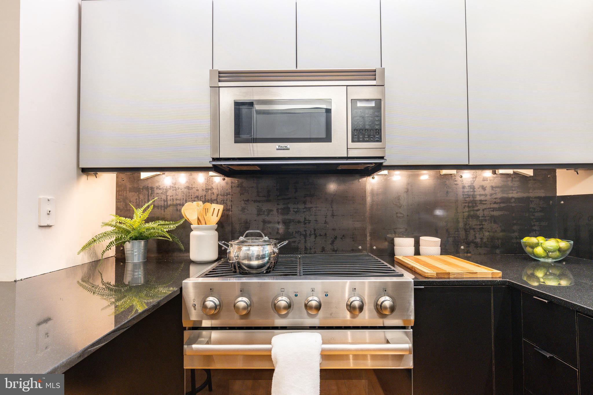 406 South 6th Street Philadelphia, PA 19147 - Photo 10 of 56 a kitchen with a stove and microwave