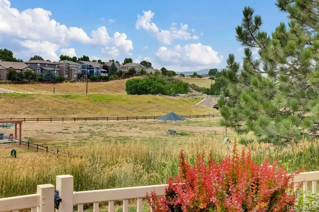 a view of a lake with a yard