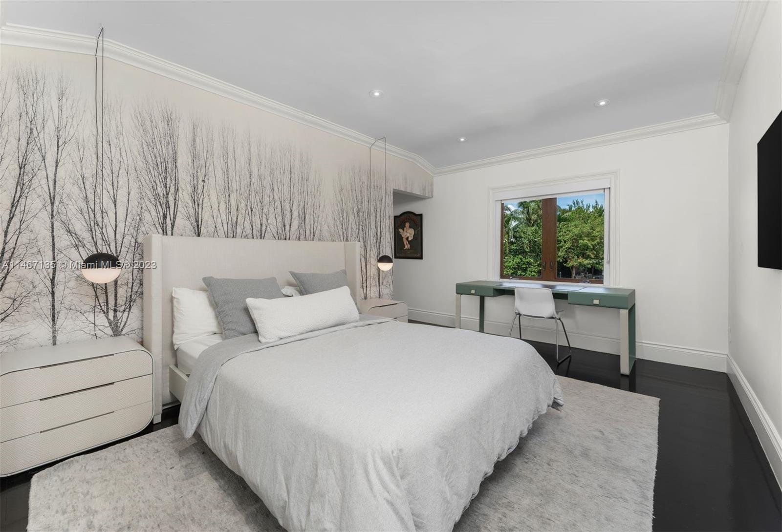 2201 Sunset Drive Miami Beach, FL 33140 - Photo 20 of 35 a bedroom with a large bed and a window