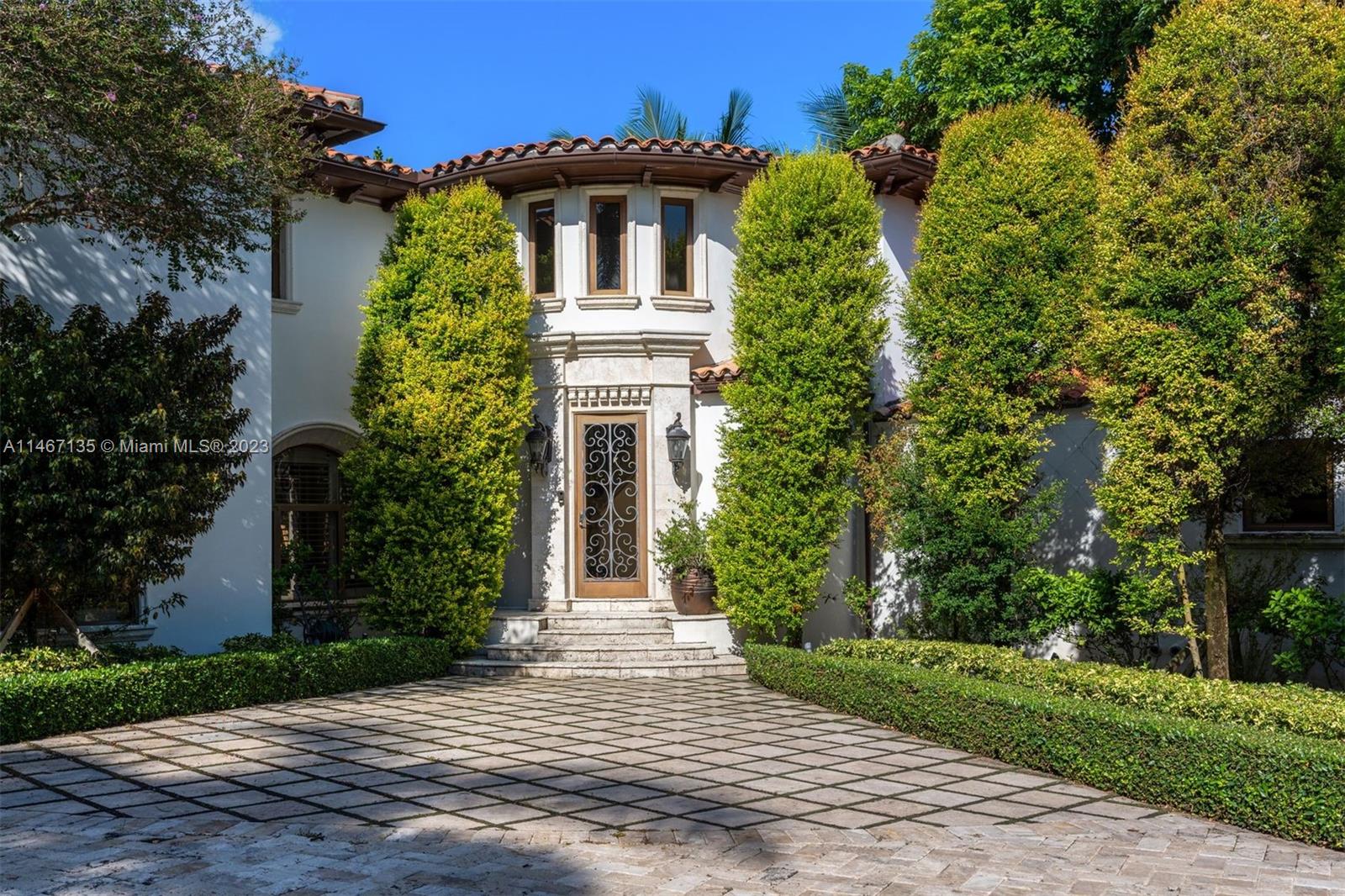 2201 Sunset Drive Miami Beach, FL 33140 - Photo 35 of 35 a front view of a house with garden