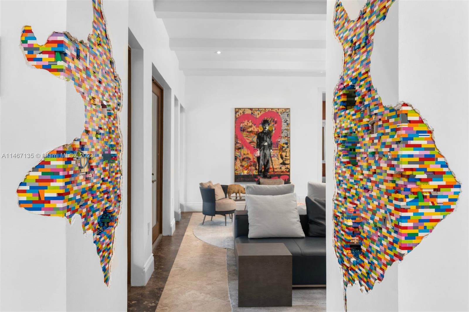 2201 Sunset Drive Miami Beach, FL 33140 - Photo 8 of 35 a living room with furniture and a potted plant