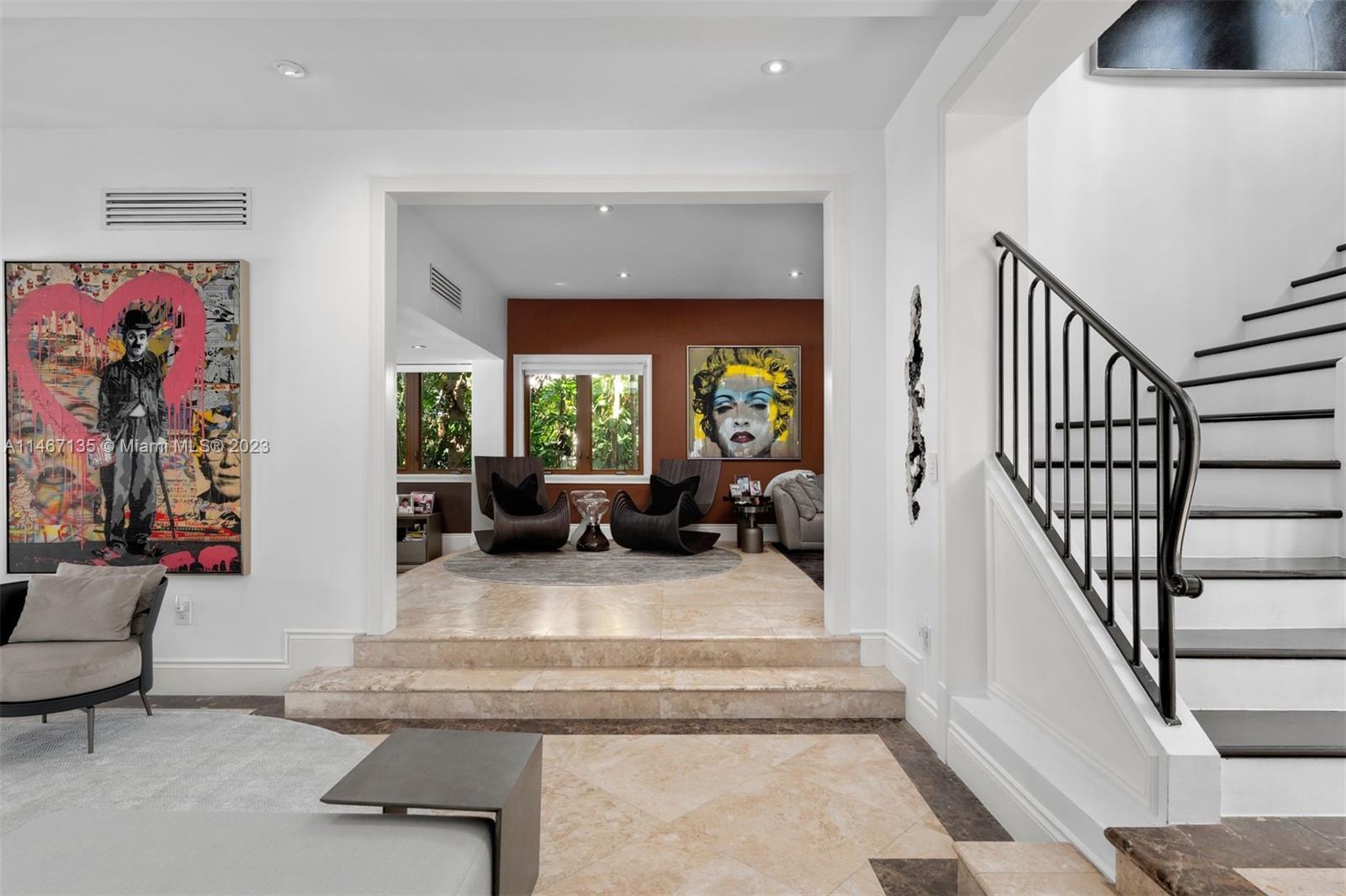 2201 Sunset Drive Miami Beach, FL 33140 - Photo 10 of 35 a view of a livingroom with furniture and stairs