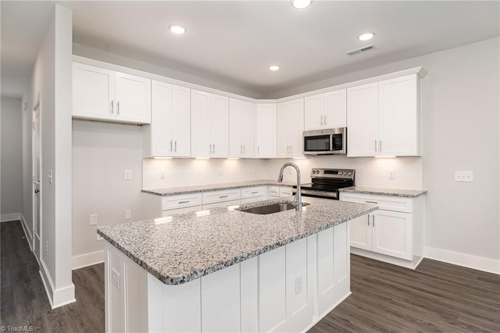 Kitchen with granite countertop