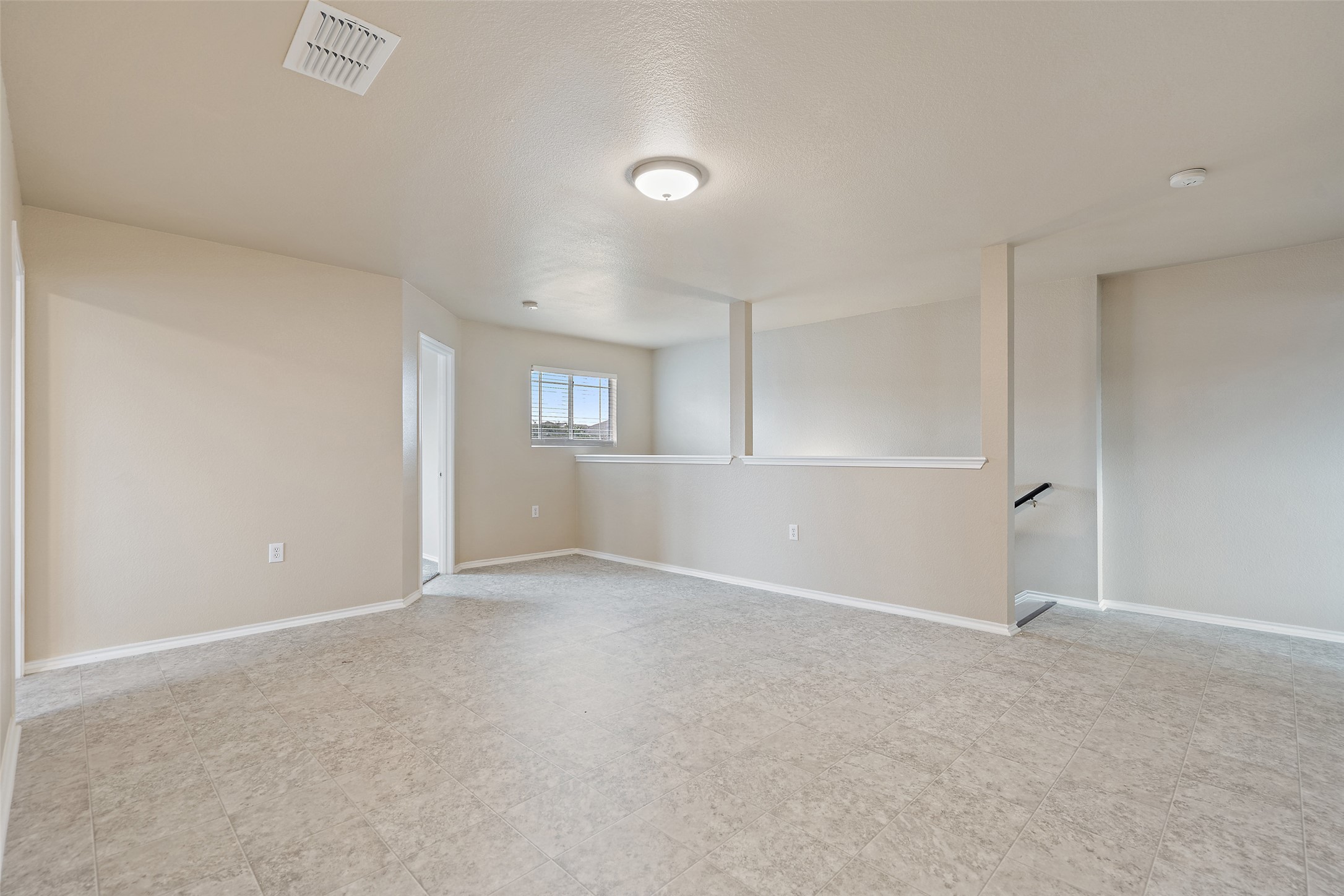 1617 Anise Drive Austin, TX 78741 - Photo 16 of 35 Empty room with baseboards