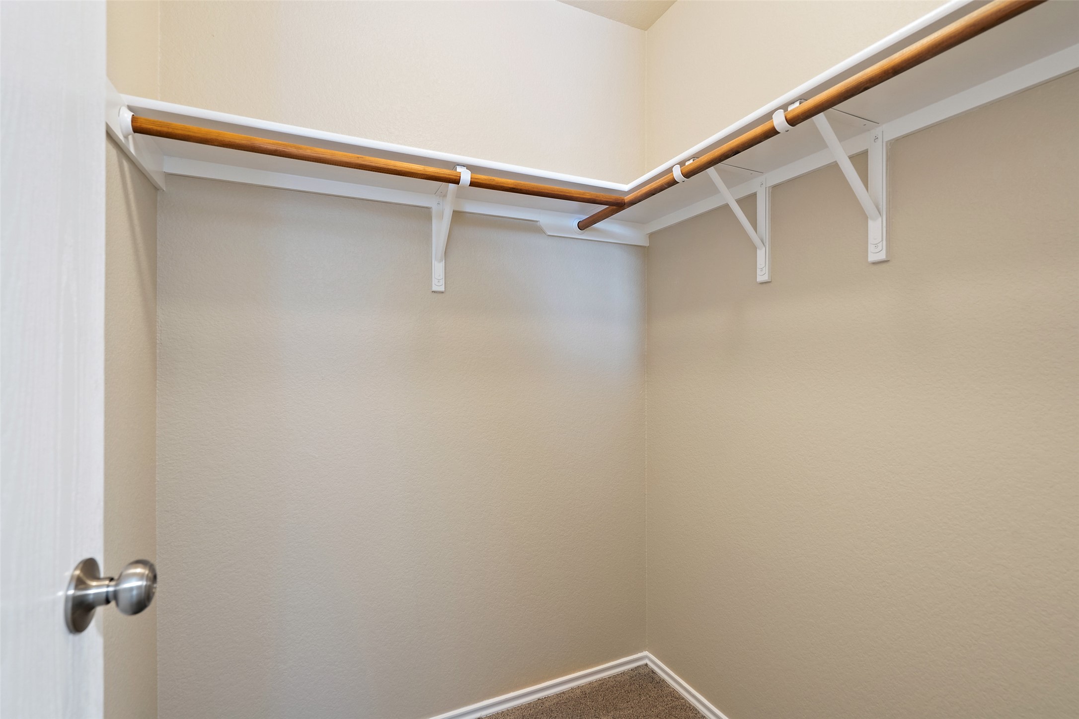 1617 Anise Drive Austin, TX 78741 - Photo 27 of 35 Walk in closet with carpet floors