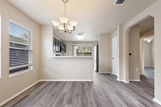 a view of a livingroom with wooden floor