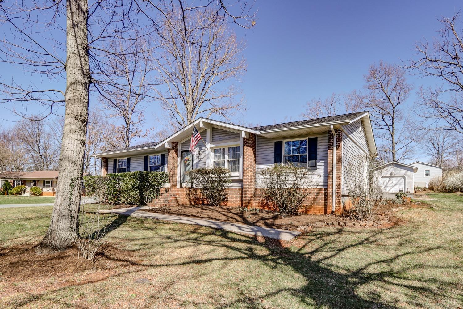 721 Doss Road Concord, VA 24538 - Photo 1 of 35 a front view of a house with a yard