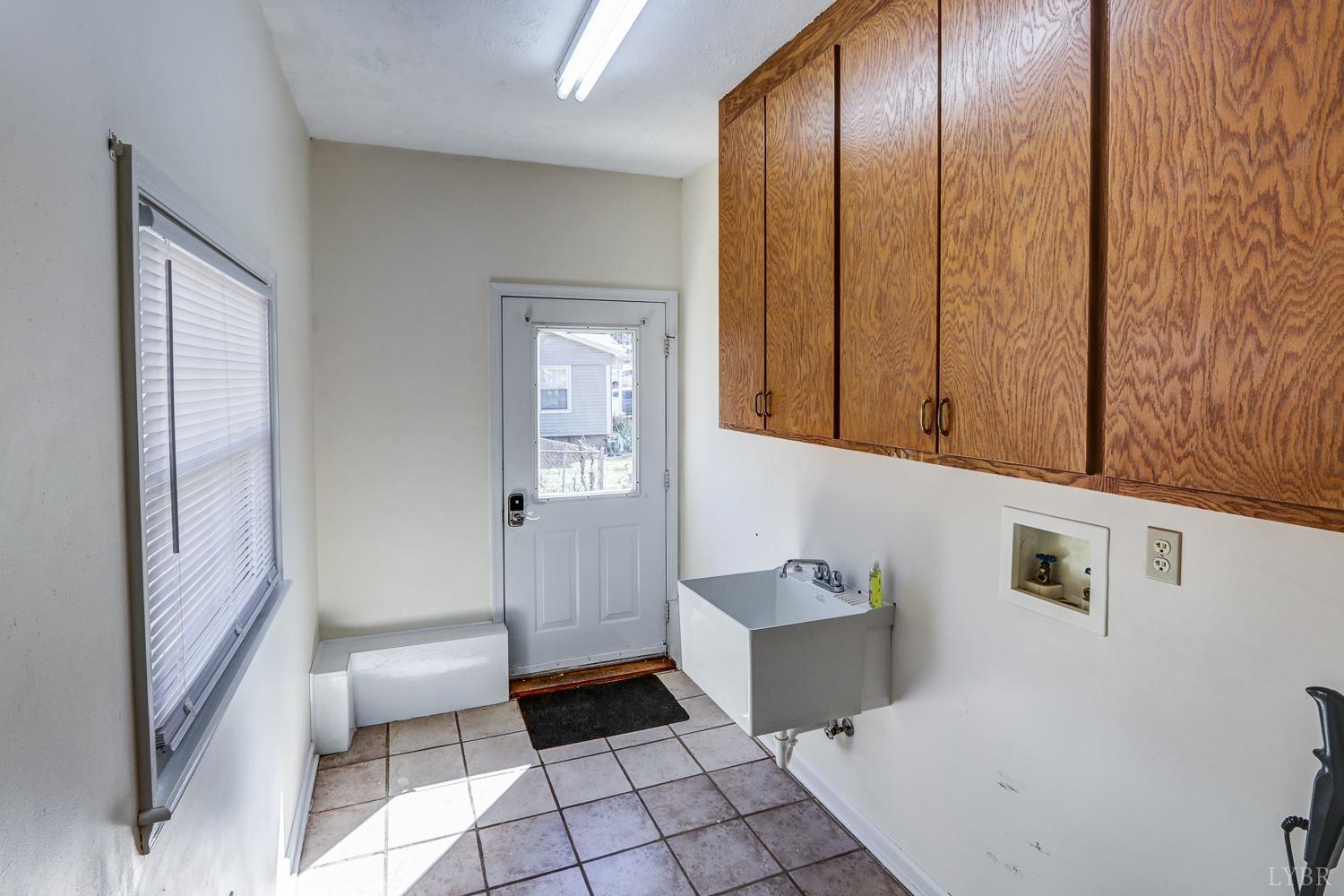 721 Doss Road Concord, VA 24538 - Photo 20 of 35 a bathroom with a sink and a mirror