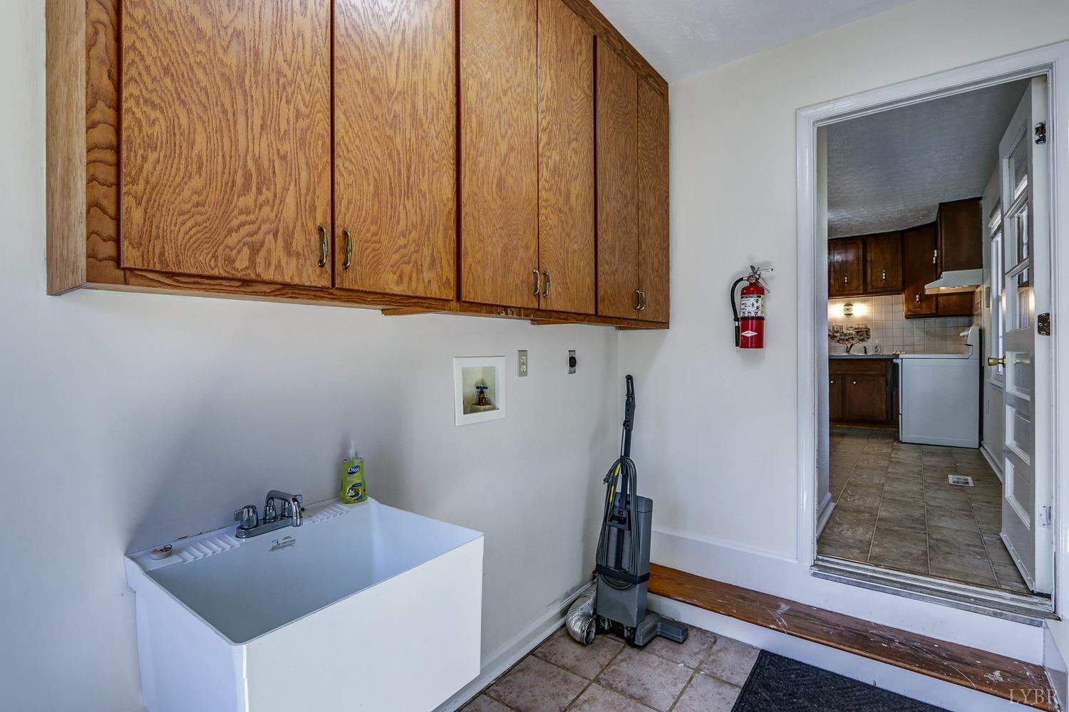 721 Doss Road Concord, VA 24538 - Photo 21 of 35 a bathroom with a sink and washing machine