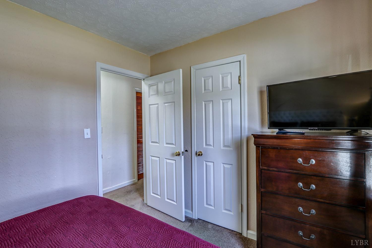 721 Doss Road Concord, VA 24538 - Photo 24 of 35 a view of a livingroom with a flat screen tv