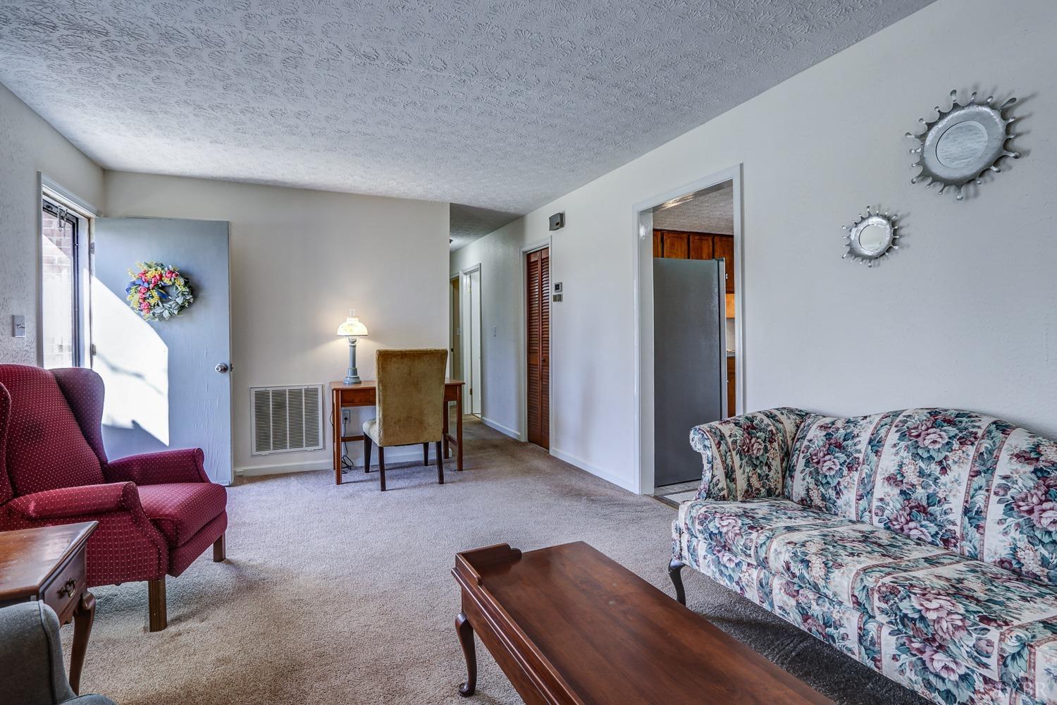 721 Doss Road Concord, VA 24538 - Photo 8 of 35 a living room with furniture and a couch