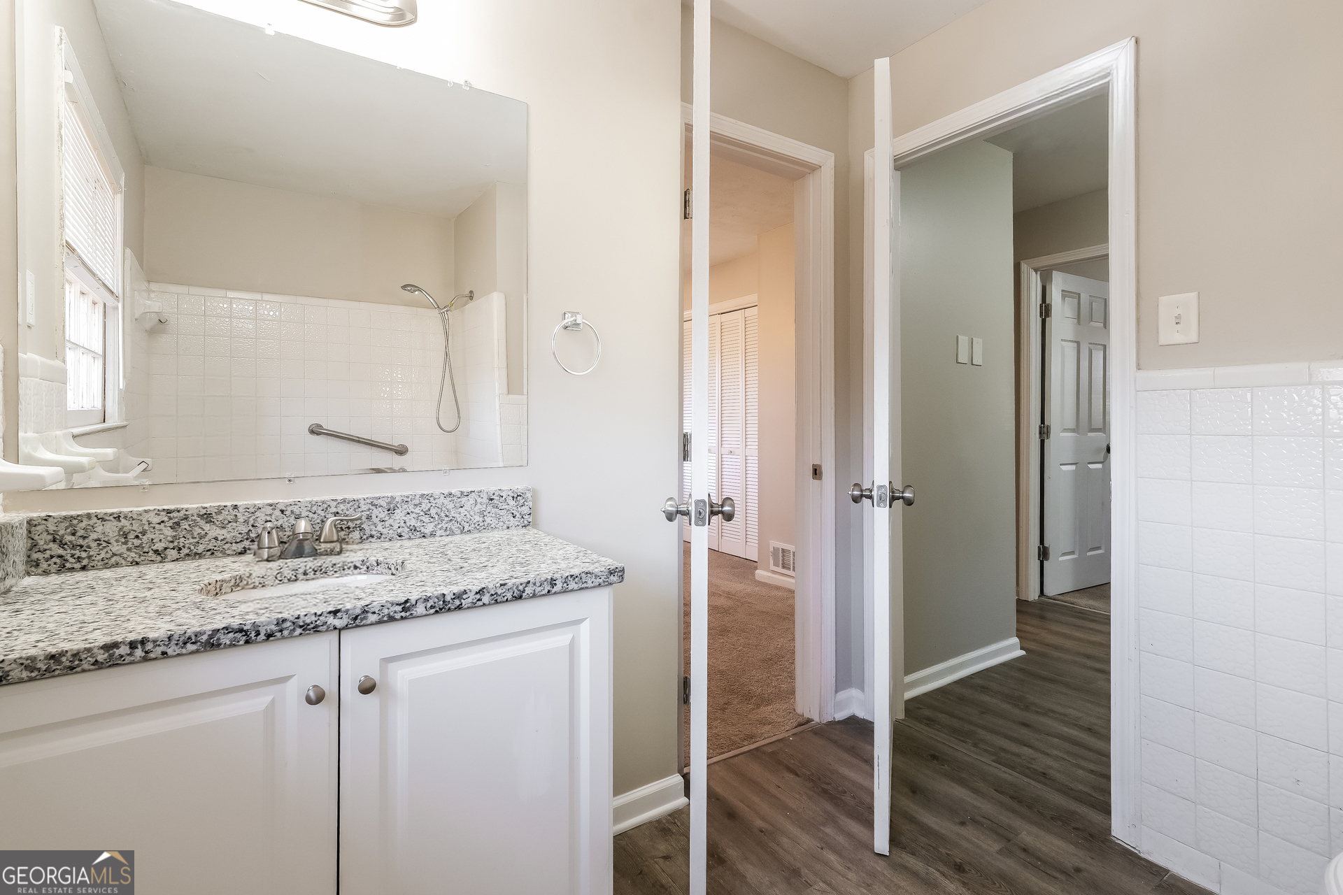 3660 Sterling Ridge Way Decatur, GA 30032 - Photo 13 of 23 a bathroom with a sink and granite