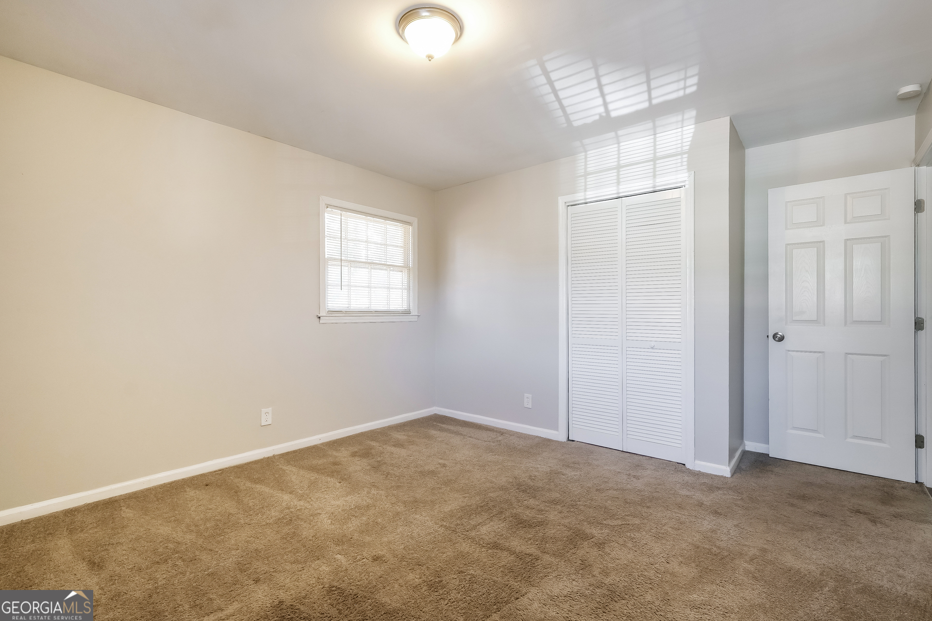 3660 Sterling Ridge Way Decatur, GA 30032 - Photo 17 of 23 an empty room with windows