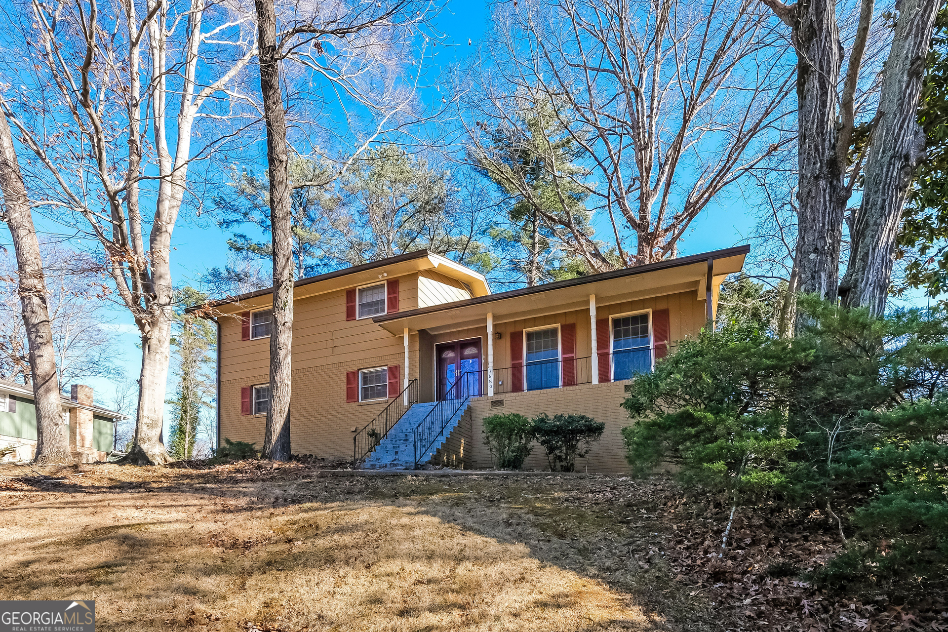 3660 Sterling Ridge Way Decatur, GA 30032 - Photo 2 of 23 a view of a house with a yard